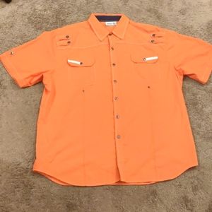 Orange and white button down shirt.